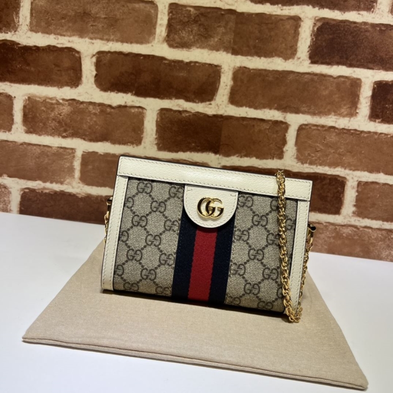 G*u*i clutch bags